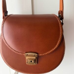 Women’s Tan Leather Crossbody Saddle Bag with Antique Gold Lock